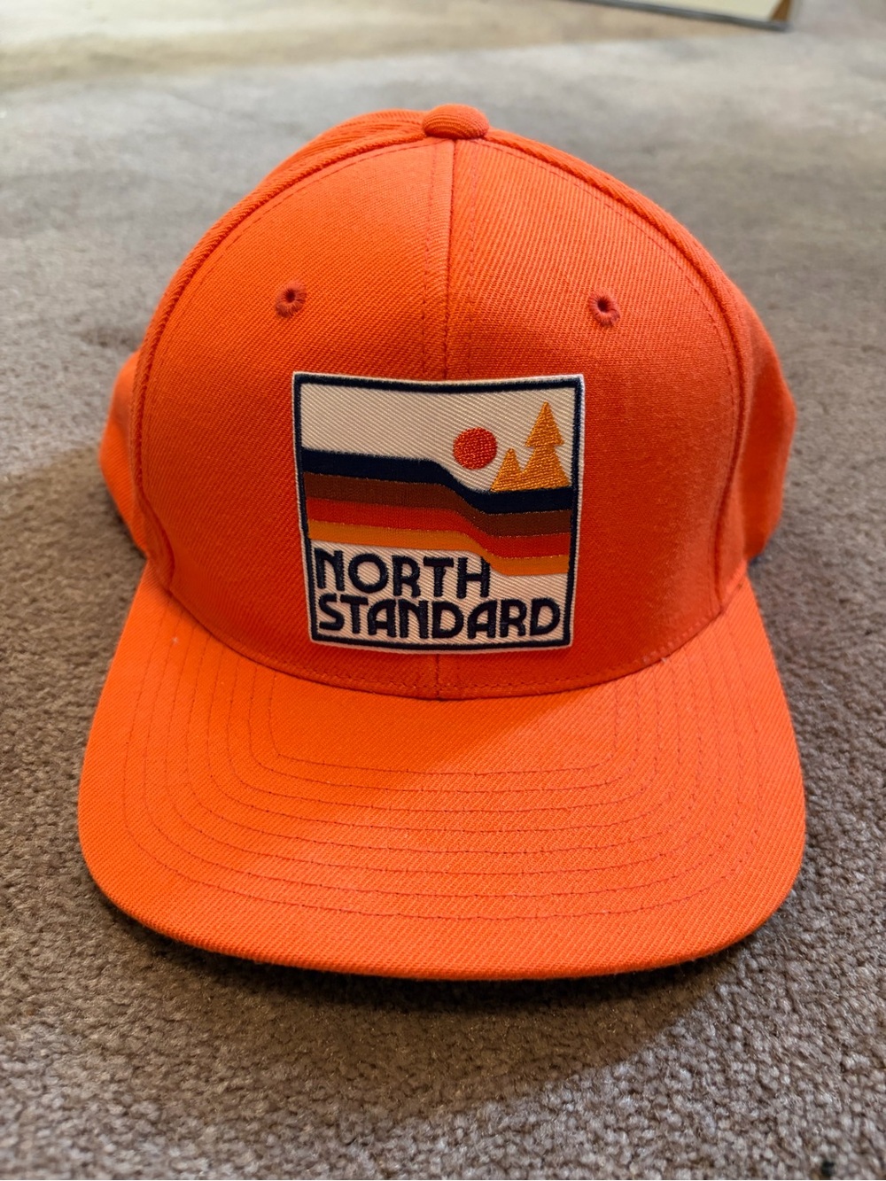 Orange North Standard Retro Logo Snapback Hat